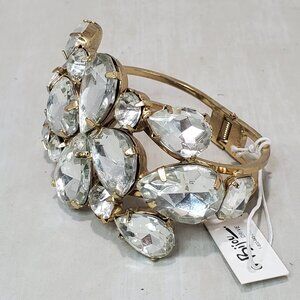 Bijou gold tone hinged bangle bracelet with faceted art glass jewel cluster